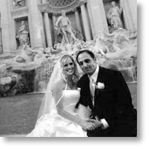 wedding in rome, typical photo of a couple at  Fontana  di Trevi rome, italy